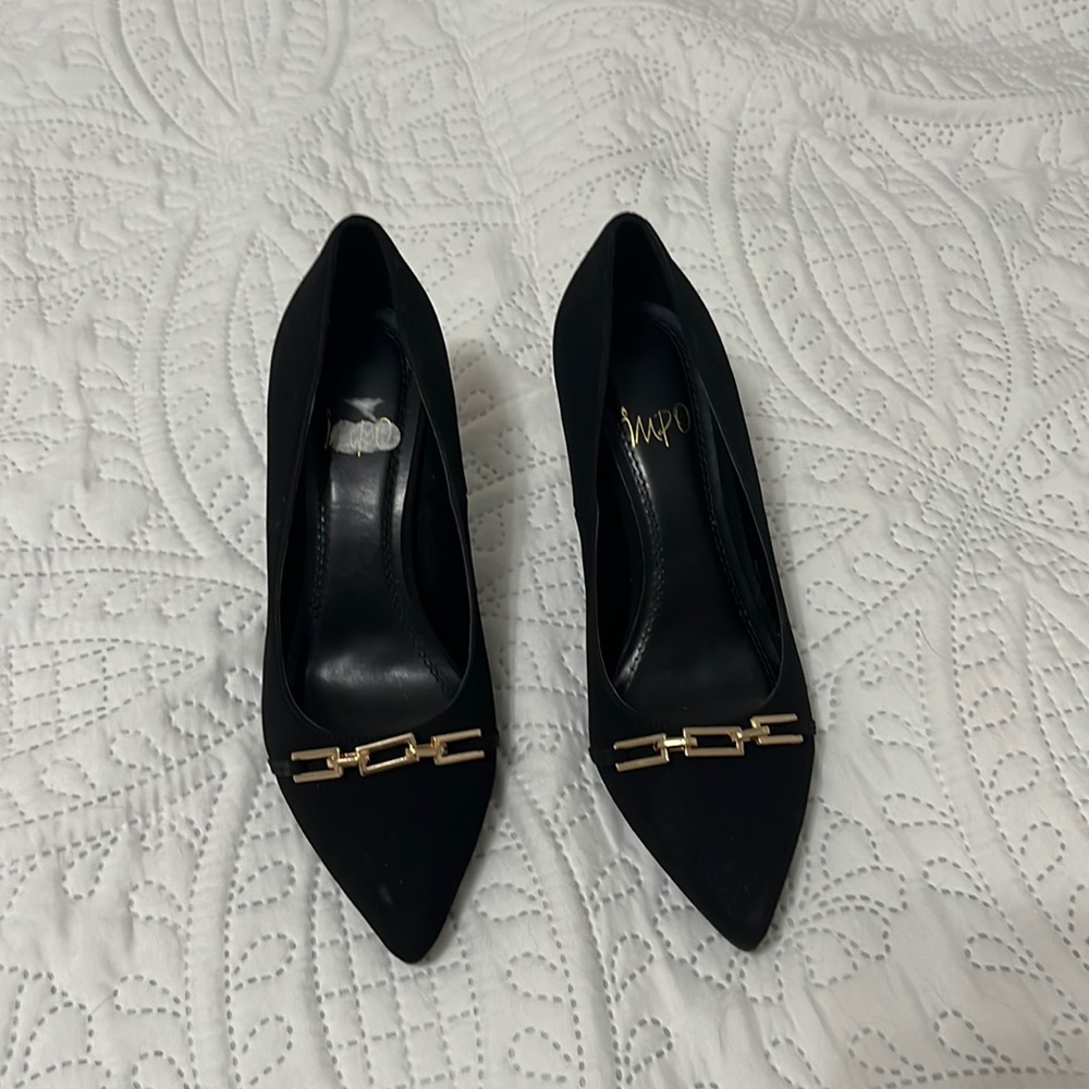 Black pumps with gold